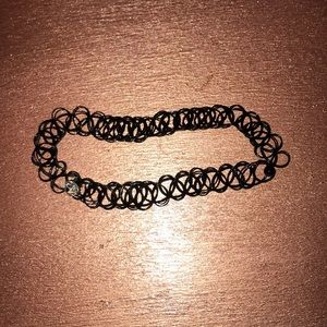 Chocker with a diamond.